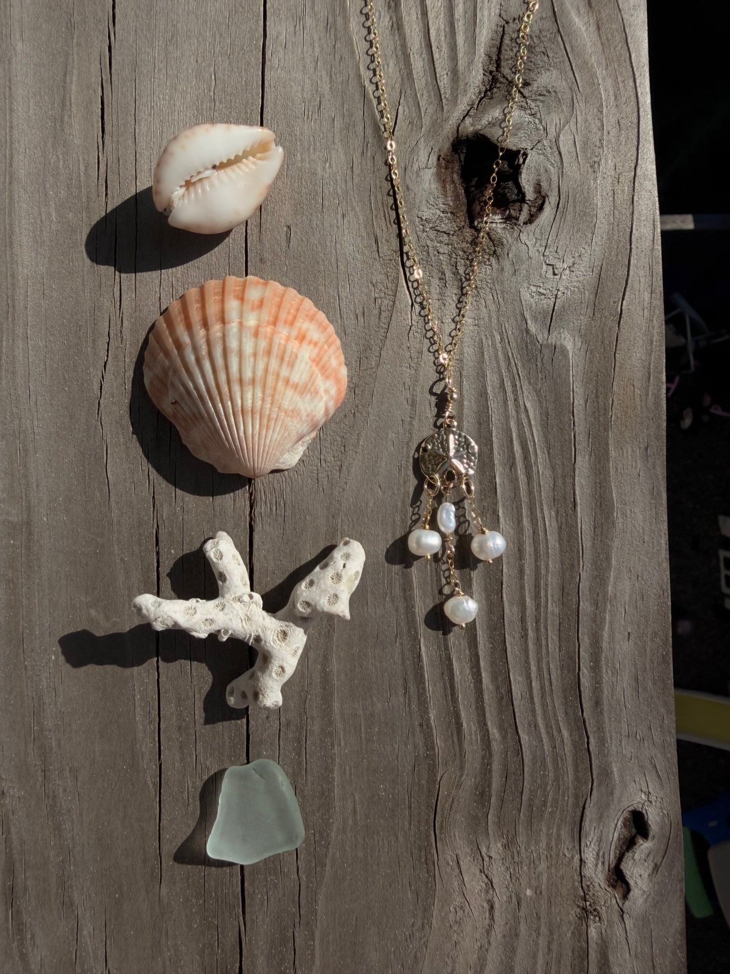 Pearly sand dollar necklace